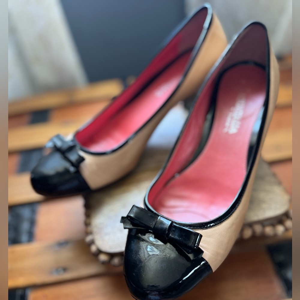 Aquatalia Black and Tan Cap Toe with Bow Pumps